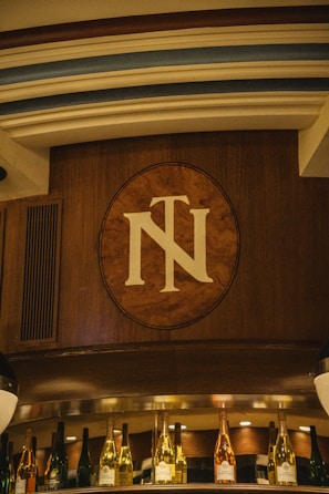 Laser-engraved wooden plaque with a personalized message in warm lighting.