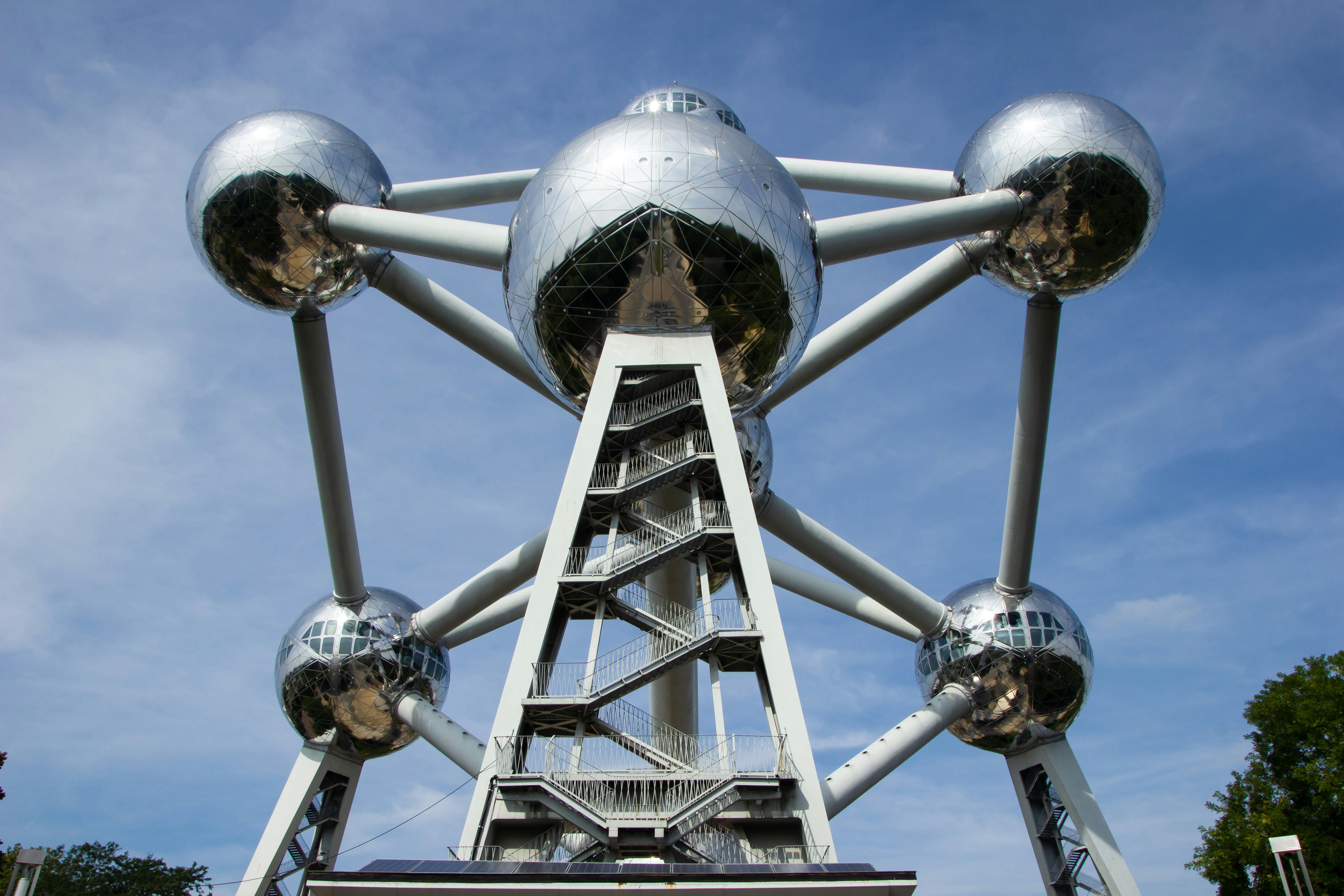 a large metal structure with multiple balls on it