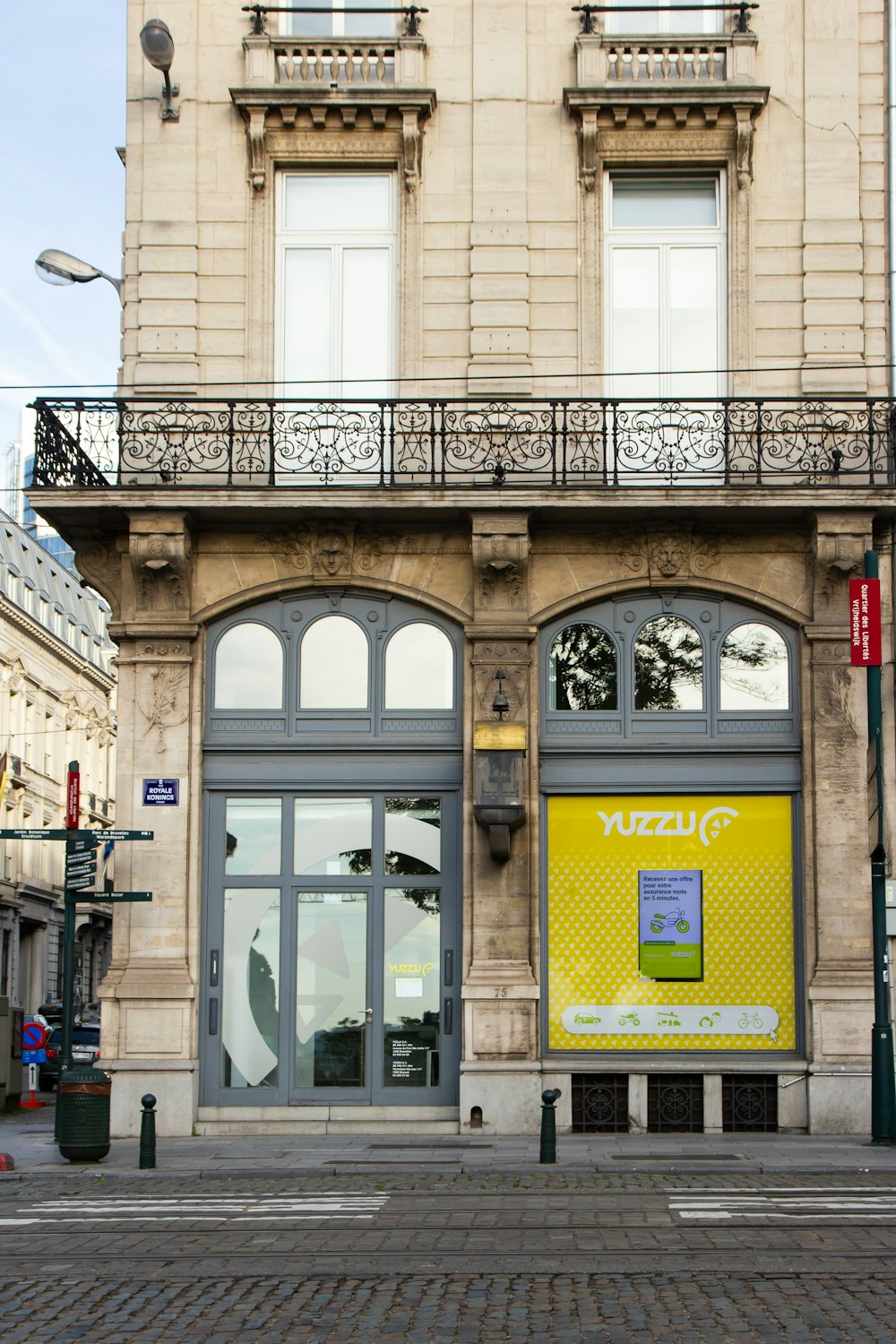 a building with a yellow sign on the front of it