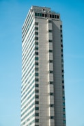 A high-rise building with spotless windows.