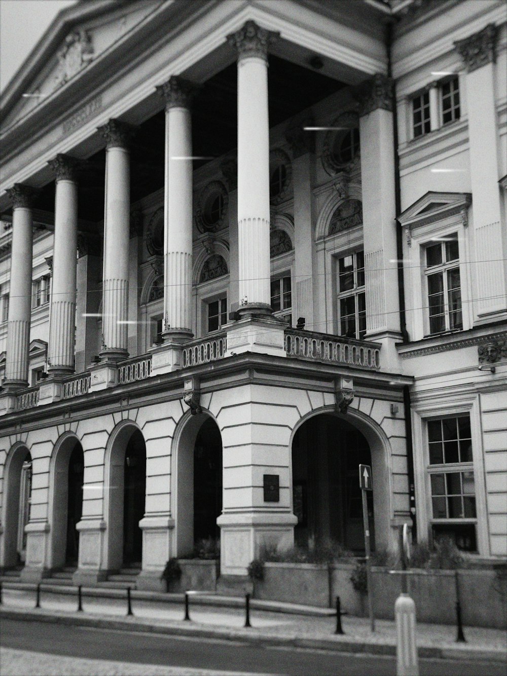 a black and white photo of a large building