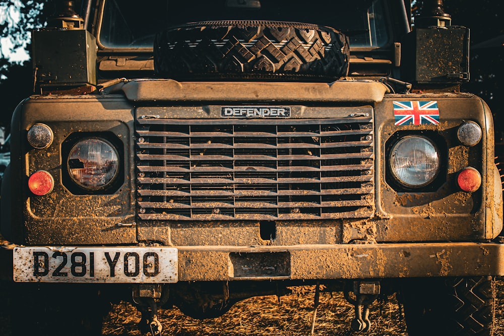 the front end of an old truck with a british flag on it