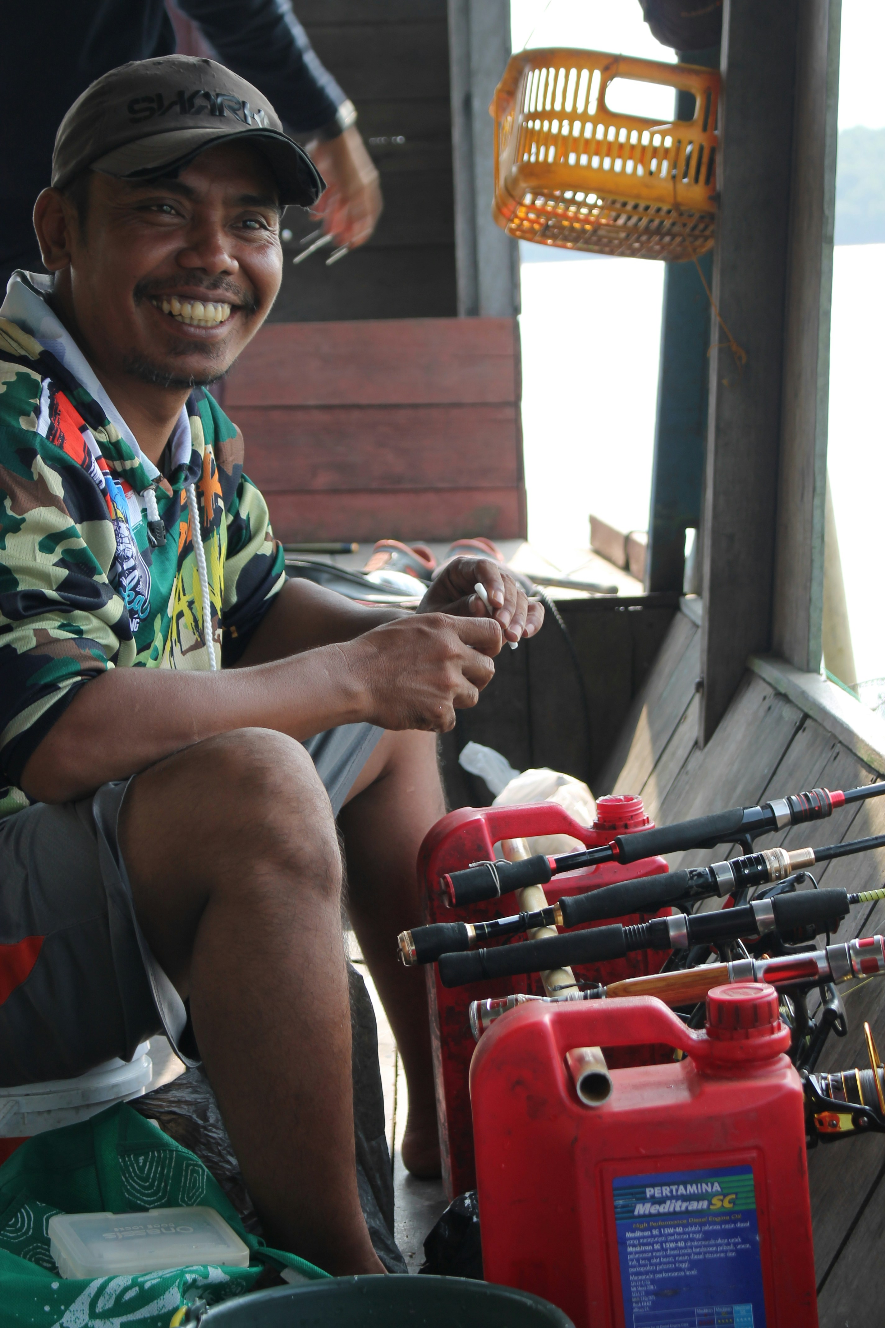Fly fishing scene on Little Red River with guide in drift boat