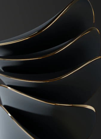 Close-up of sophisticated geometric golden lines over a matte black surface with subtle glowing particles.