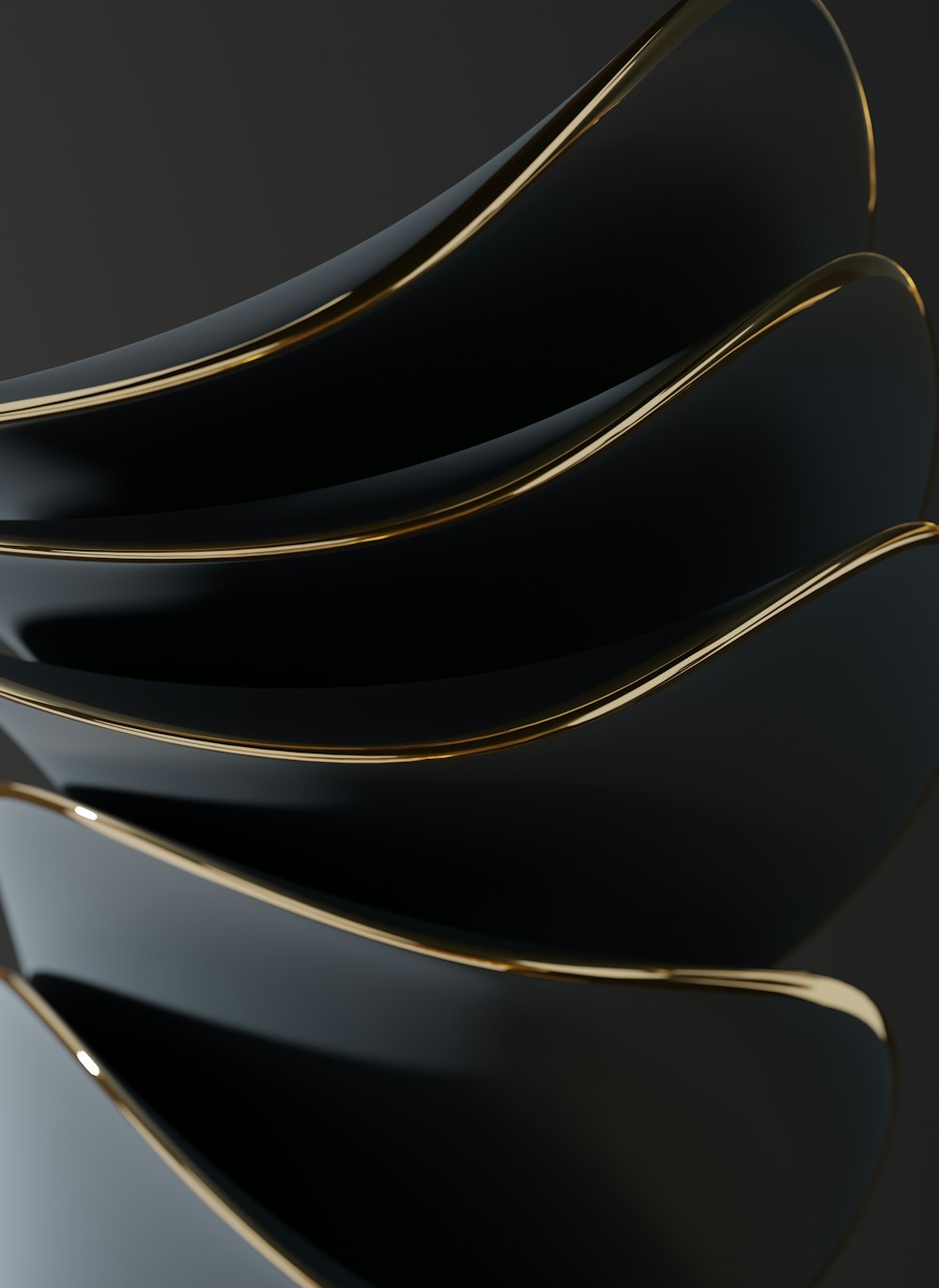 a close up of a black and gold object