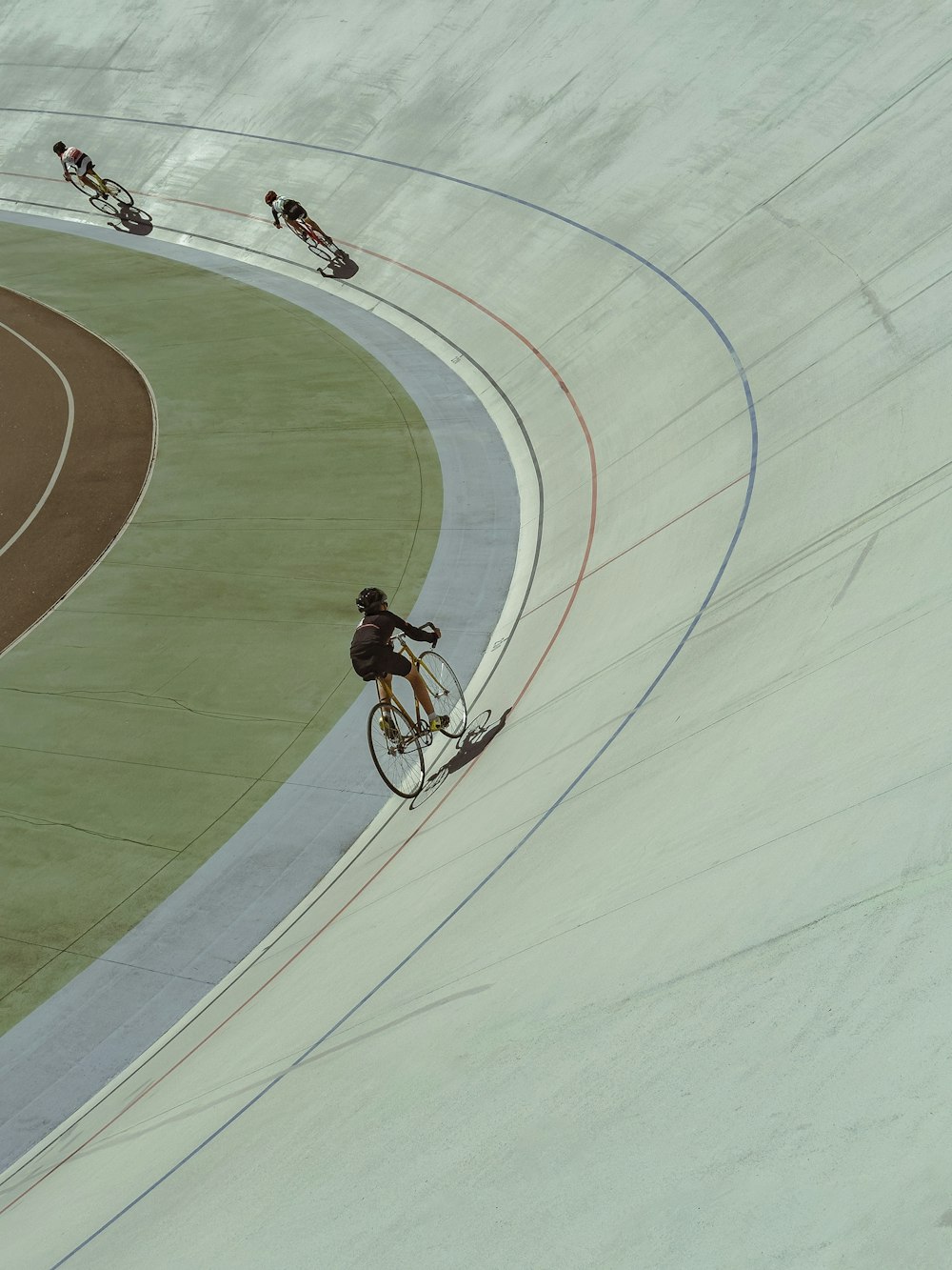 a person riding a bike on a track