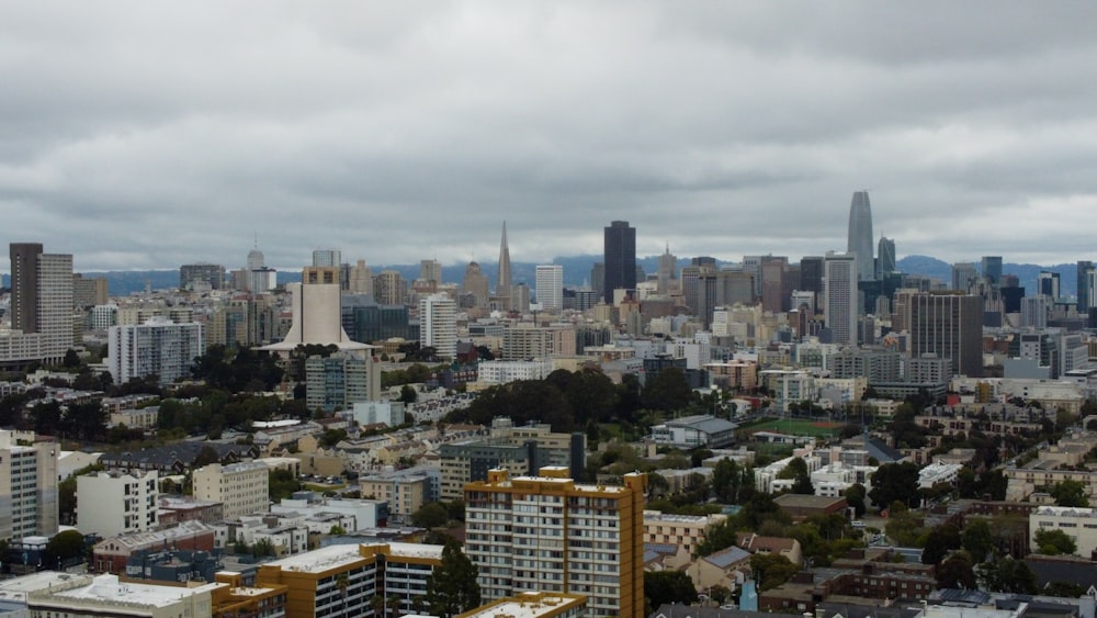 a view of a city from the top of a hill