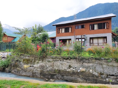 a house with a mountain in the background
