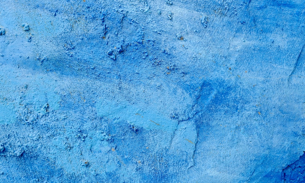 a close up of a blue paint texture