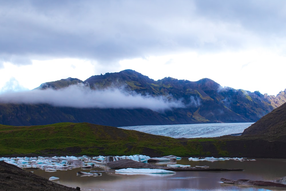 a large body of water surrounded by mountains