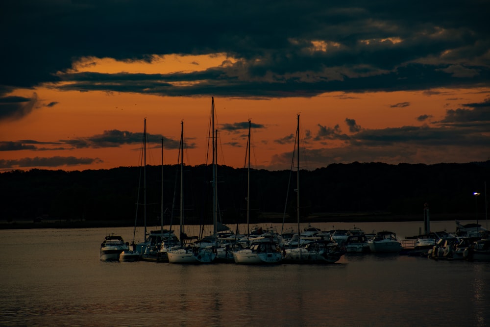 a bunch of boats that are sitting in the water