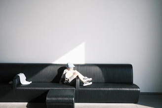 A satisfied customer relaxing on a freshly cleaned sofa.