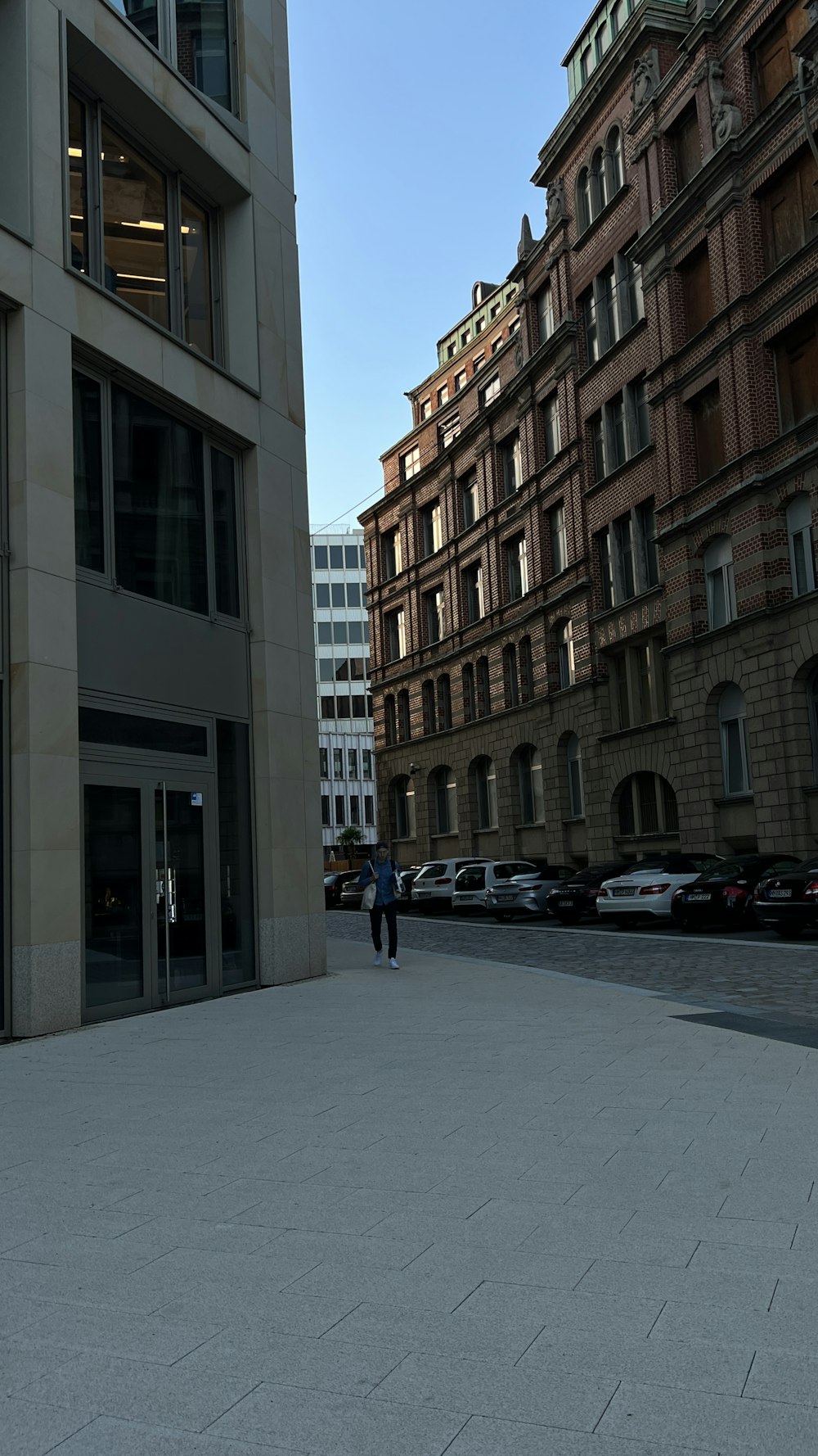 a couple of people that are standing in front of a building