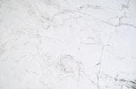 Close-up of the lightweight stone sheet’s smooth finish and subtle veining.