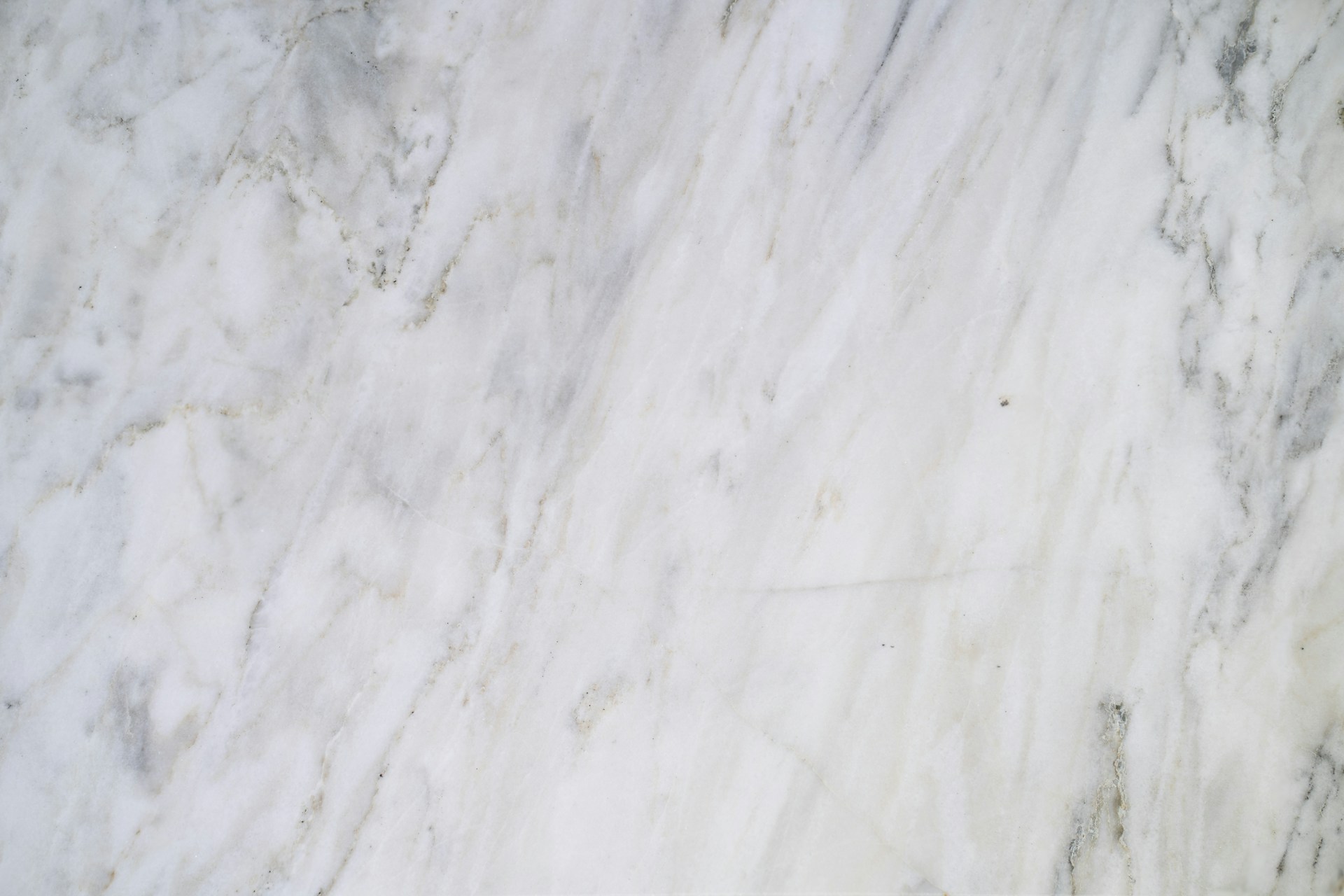 a close up of a white marble surface