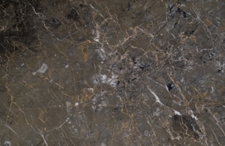 a black and brown marble textured background