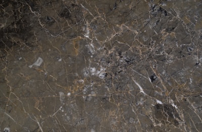 a black and brown marble textured background