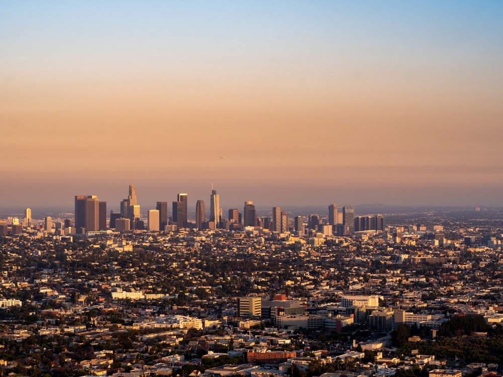 a view of a city from the top of a hill