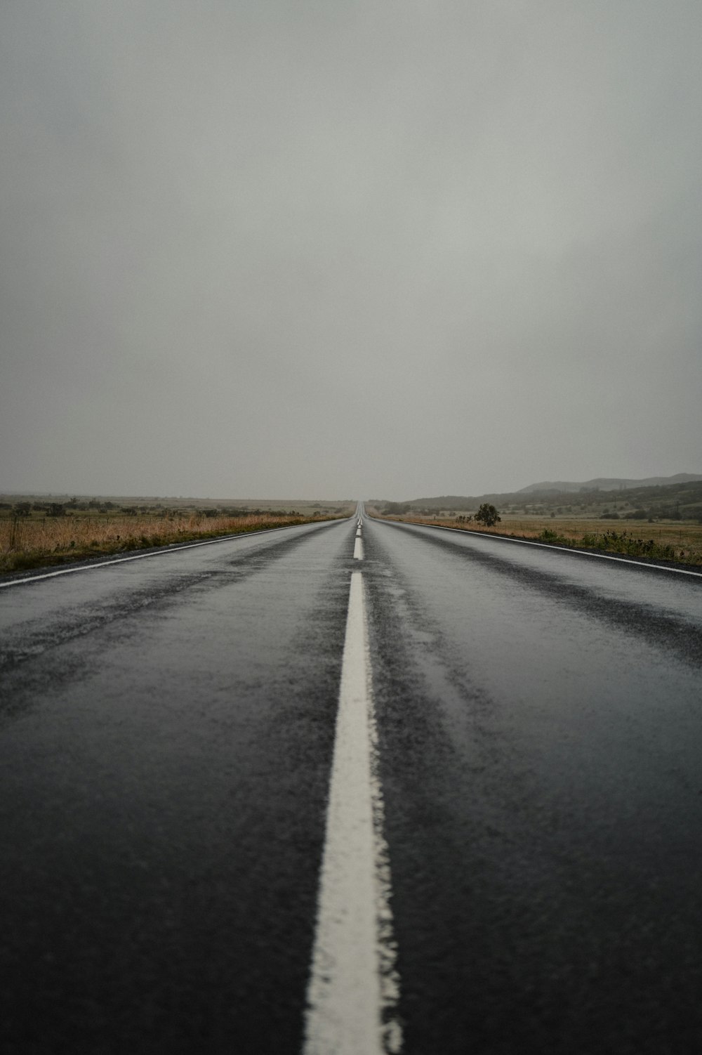 an empty road in the middle of nowhere