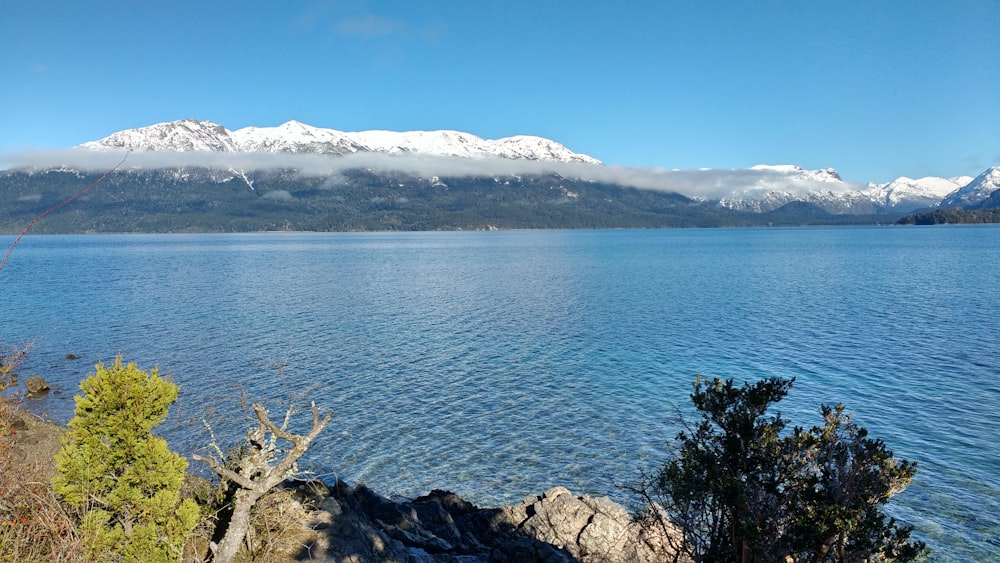 a view of a lake with mountains in the background