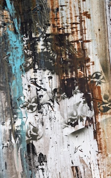 Abstract nature-inspired painting with turquoise and green hues.