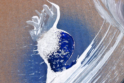 Art print showcasing layered brush textures in cobalt blue and warm cream tones.