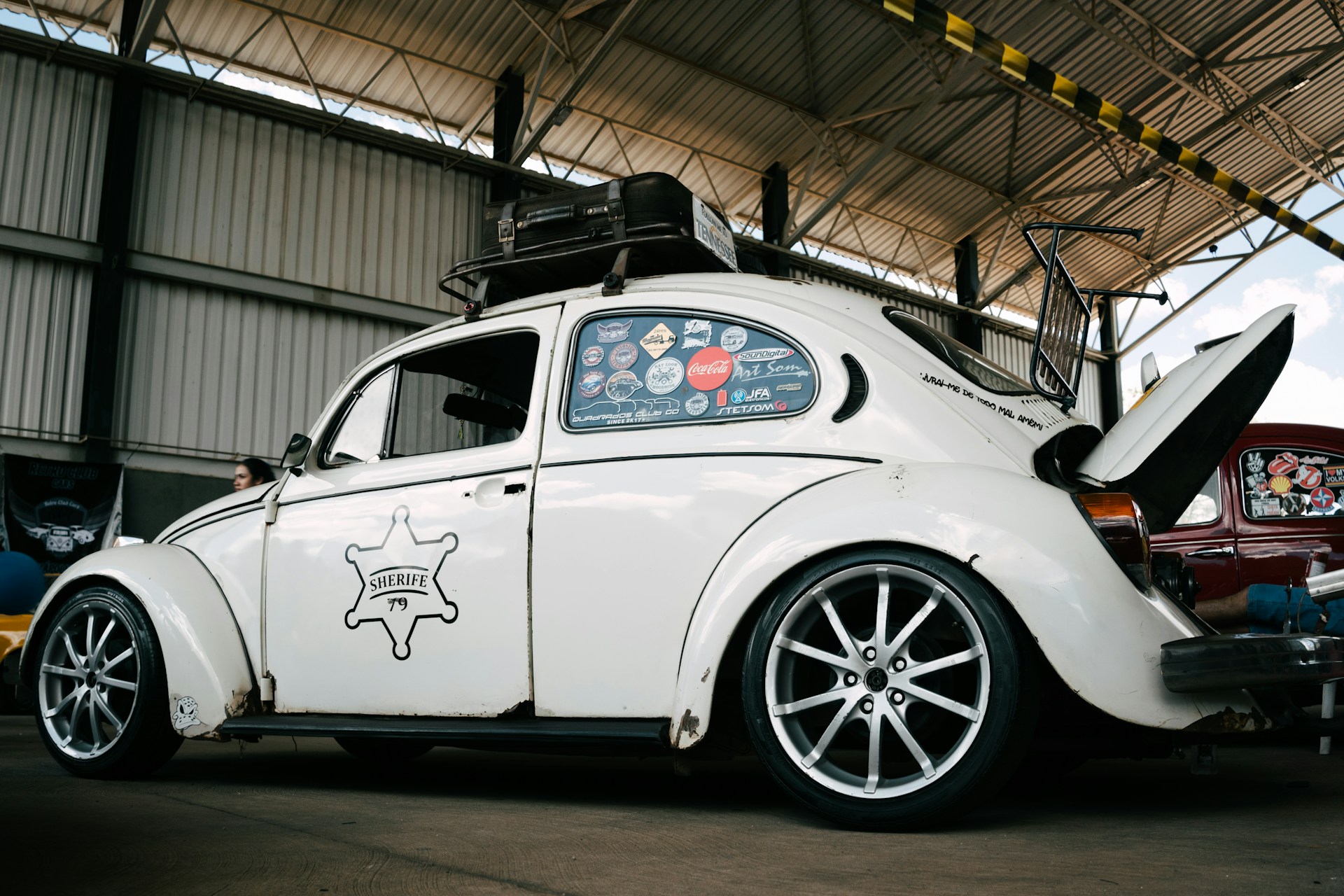 black and brown leather padded tub sofa