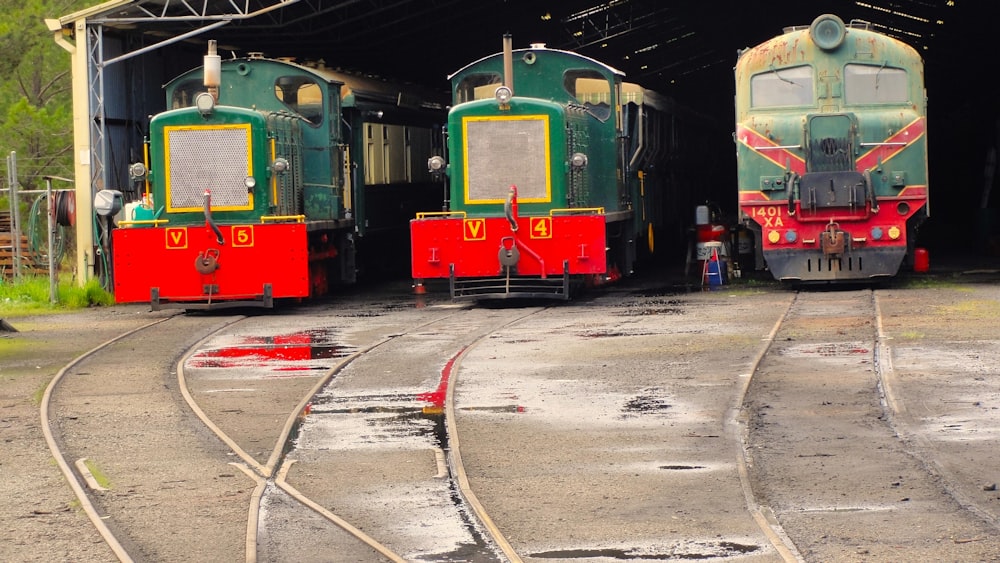 a couple of trains parked next to each other