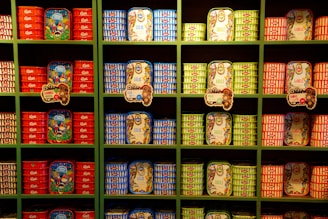 Stacks of neatly canned tuna ready for shipment in a warehouse.