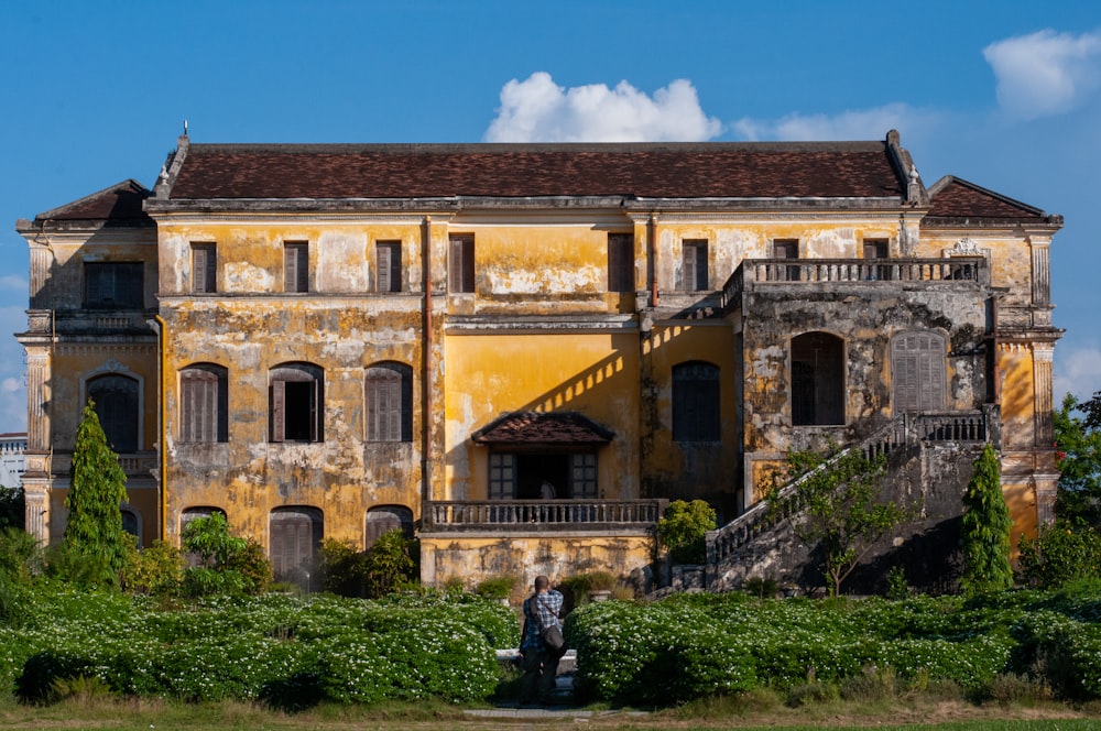 an old building with a staircase leading up to it