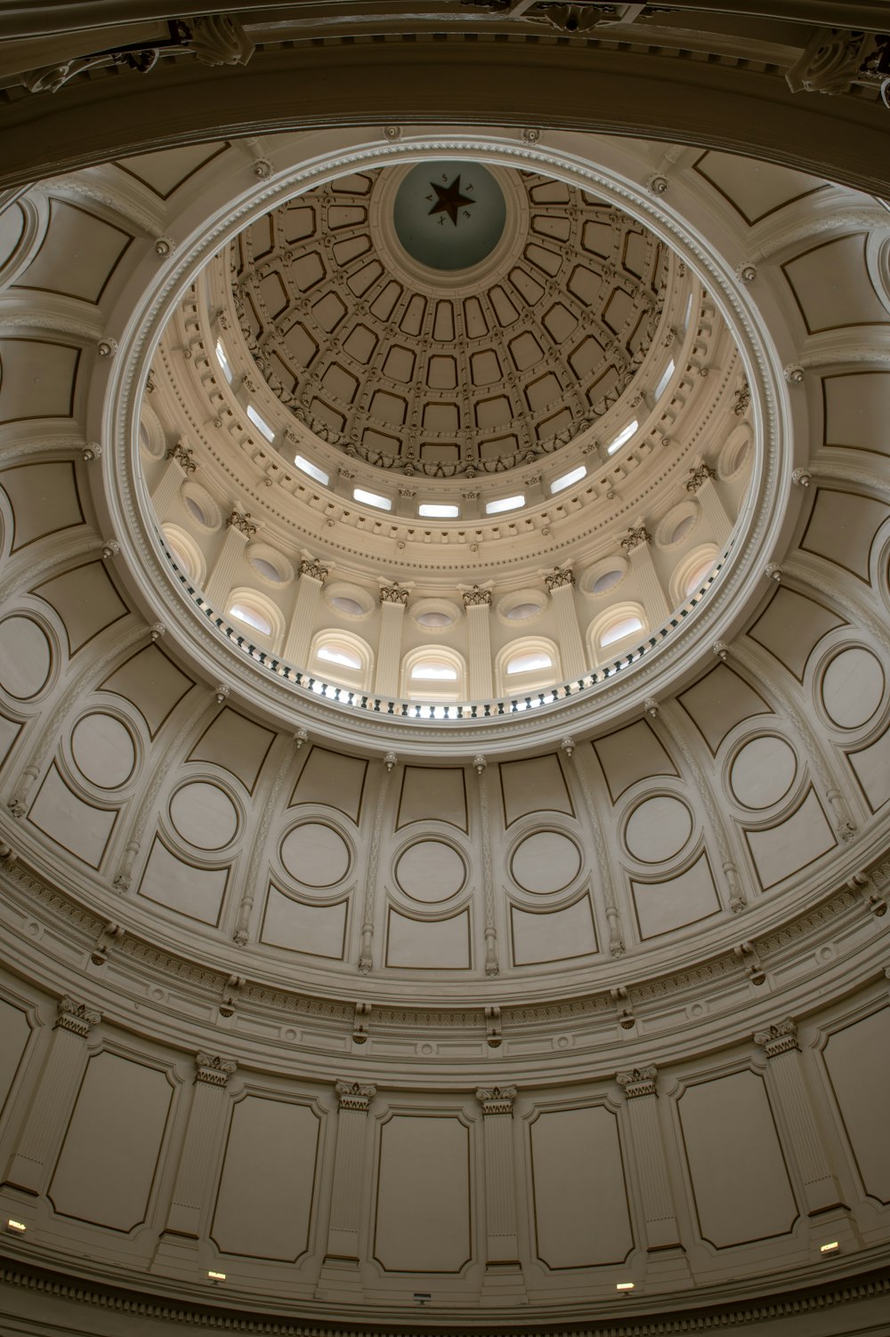 the ceiling of a large building with a domed ceiling