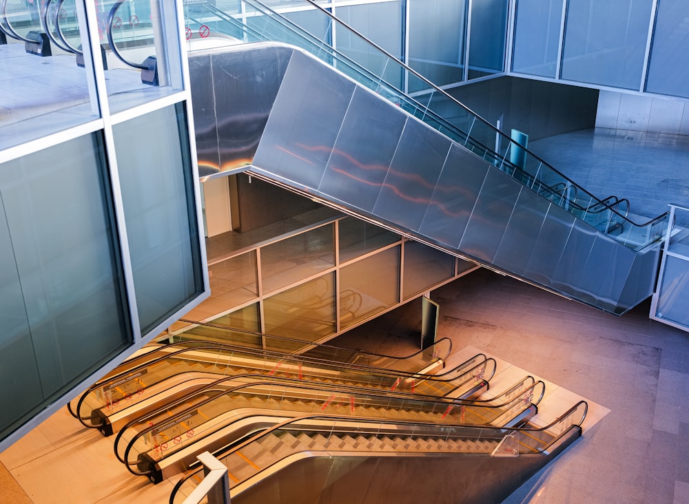an escalator in a building with a bunch of escalators