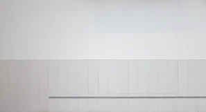 A minimalist wall art piece featuring soft pastel colors and clean lines