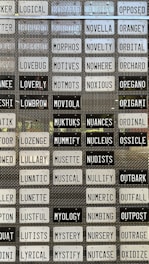 A collection of UK number plates featuring unique letter and number combinations.