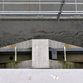 a view of a bridge over a body of water