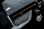 a close up of a car dashboard with a cell phone