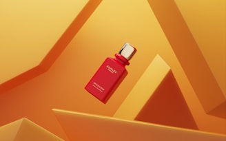 A bottle of perfume sitting on top of a table