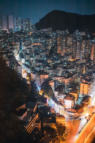 an aerial view of a city at night