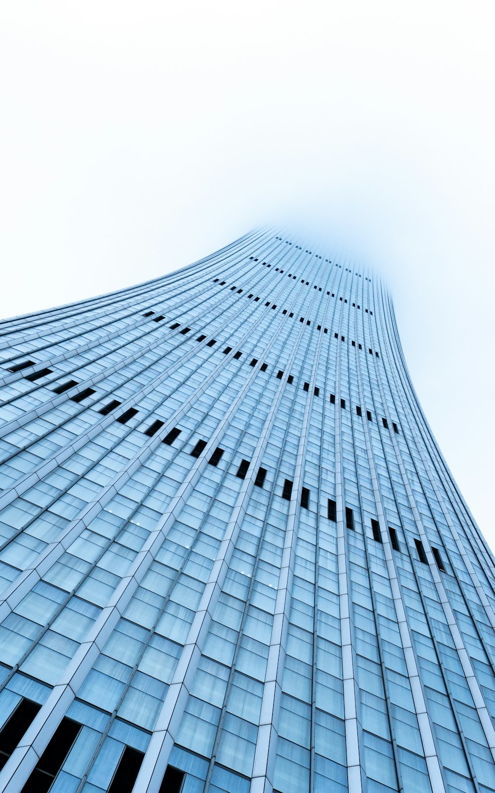 a very tall building with lots of windows