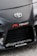 The image features the front part of a car with a focus on the bumper and grill area. Prominently displayed is the Toyota logo in the center of the car's hood. Nearby, there are several decals, including the words 'TENACI Parts for Racecars' in white with a red gear graphic, and 'altigarasjen.no' along with the 'Pandem' logo.