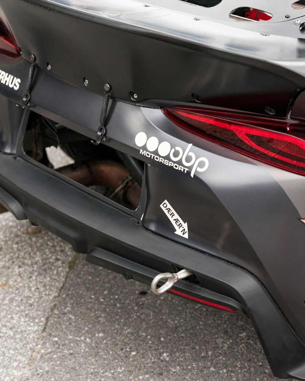 a close up of the rear end of a sports car
