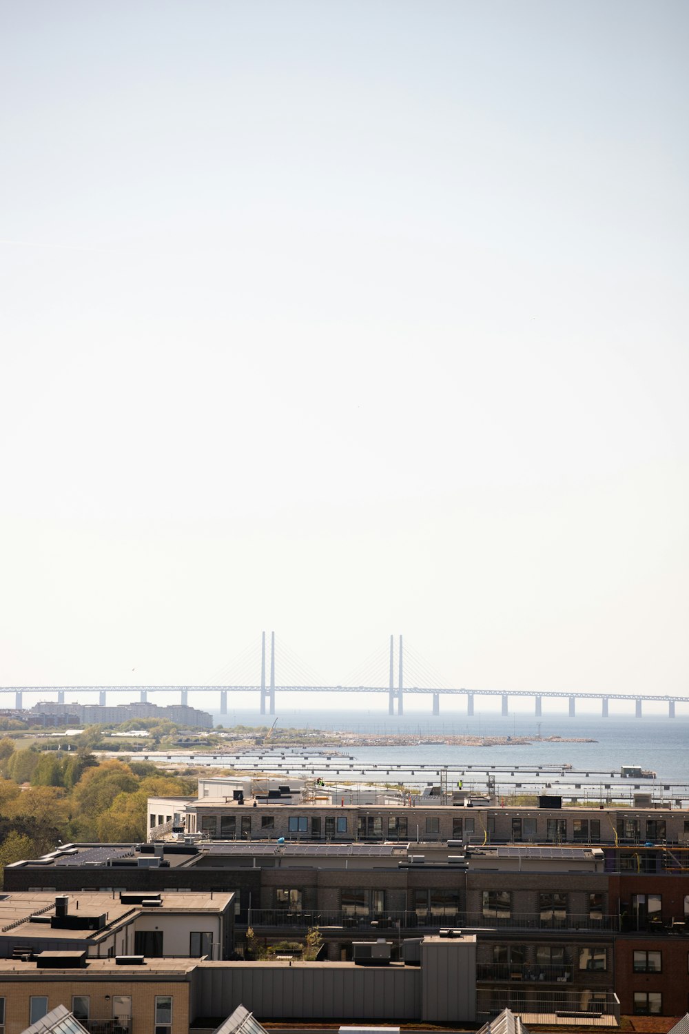 a train traveling over a bridge over a large body of water