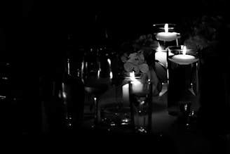 A serene table setting featuring ceravette candles glowing warmly during an intimate celebration.