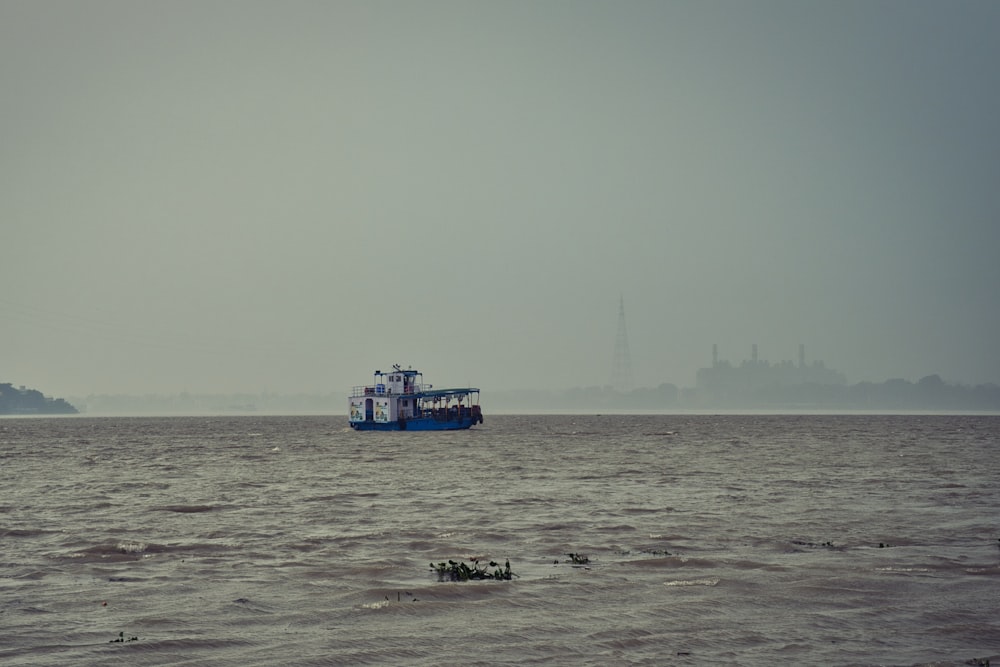 a large boat floating on top of a large body of water