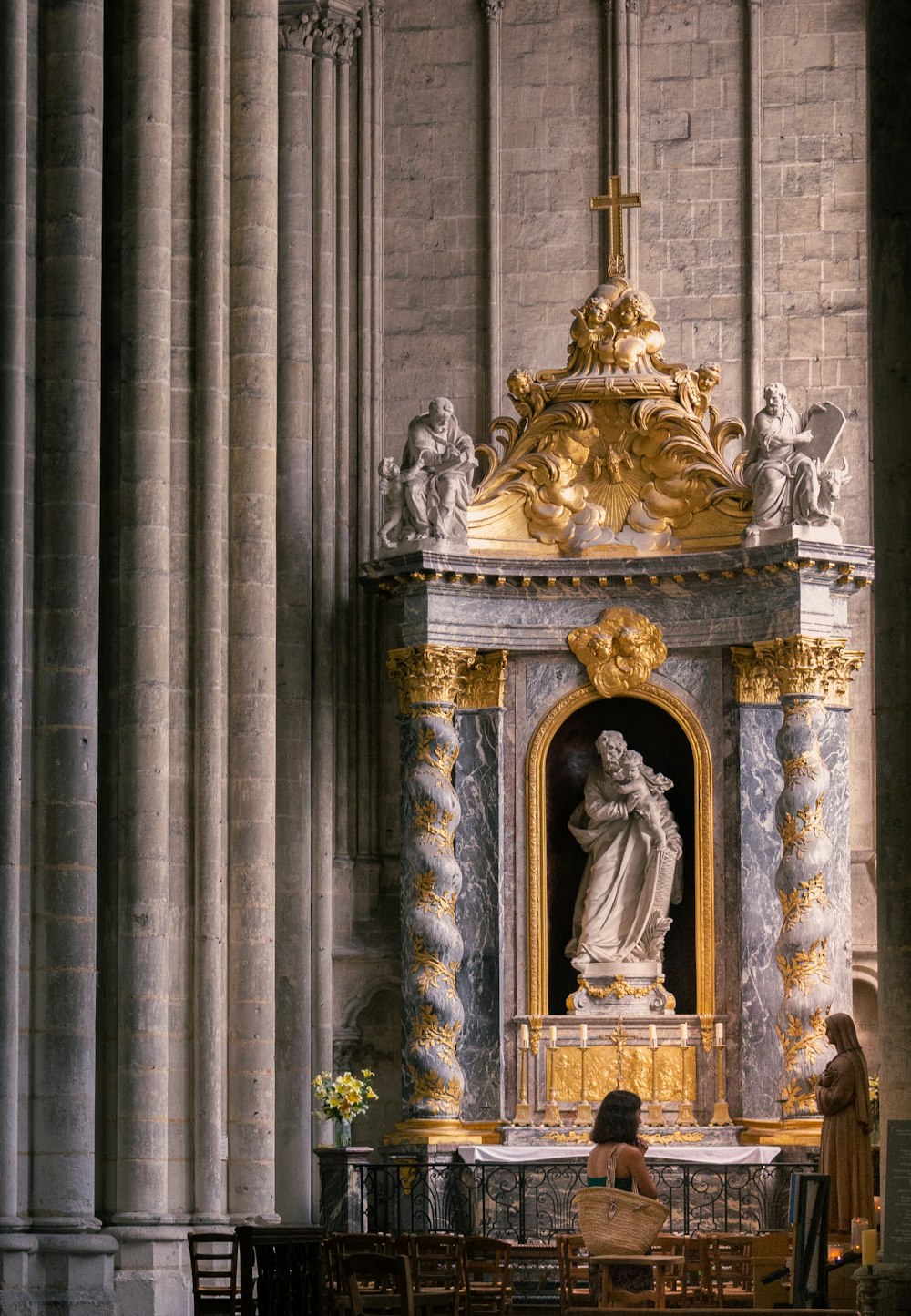 a statue of a woman in a church
