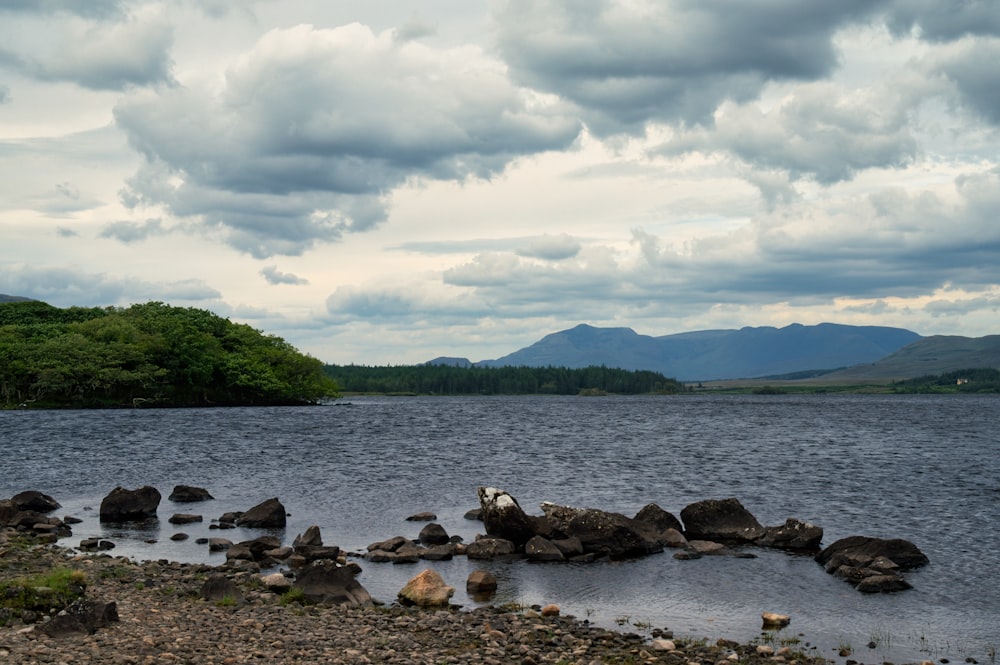 a large body of water surrounded by rocks