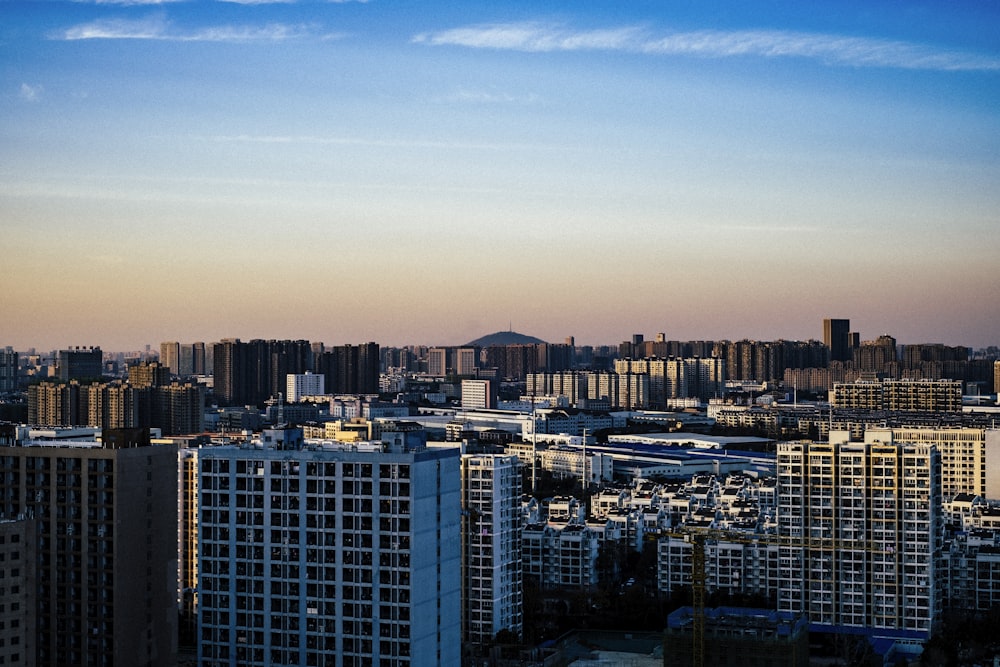 a view of a city with tall buildings