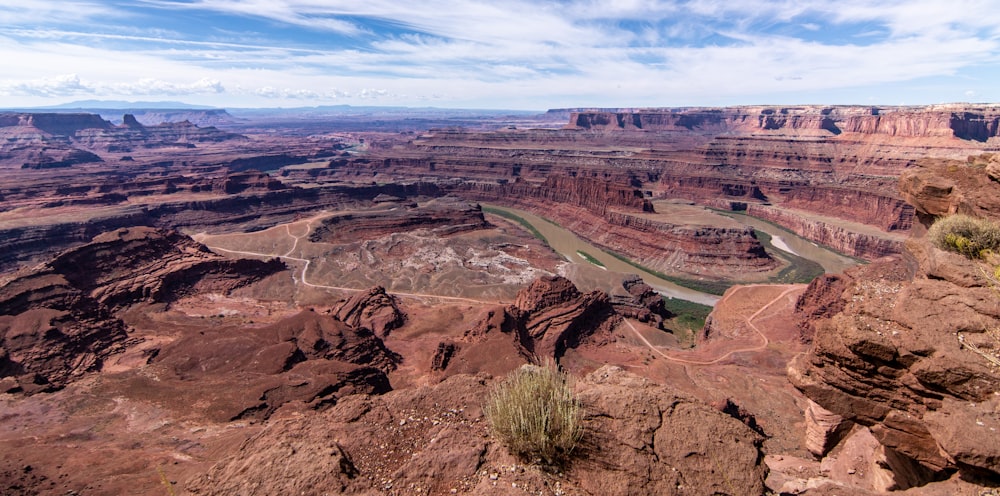 a scenic view of a river in the middle of a canyon