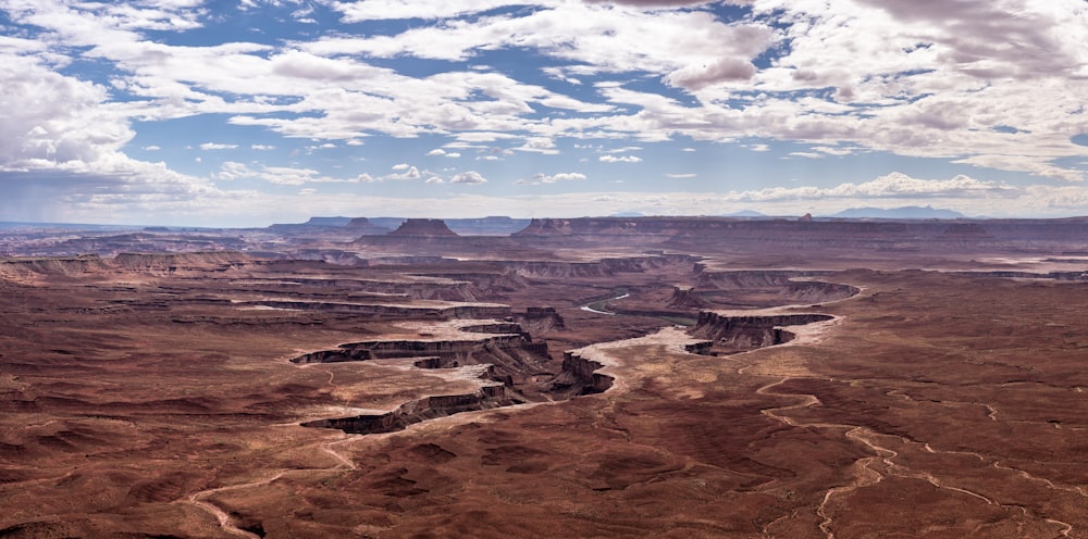 a scenic view of a river in the middle of a desert