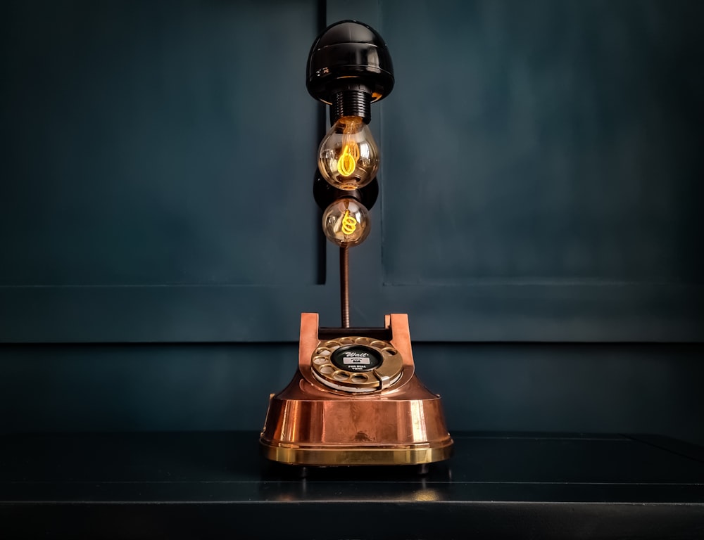an old fashioned phone is sitting on a table